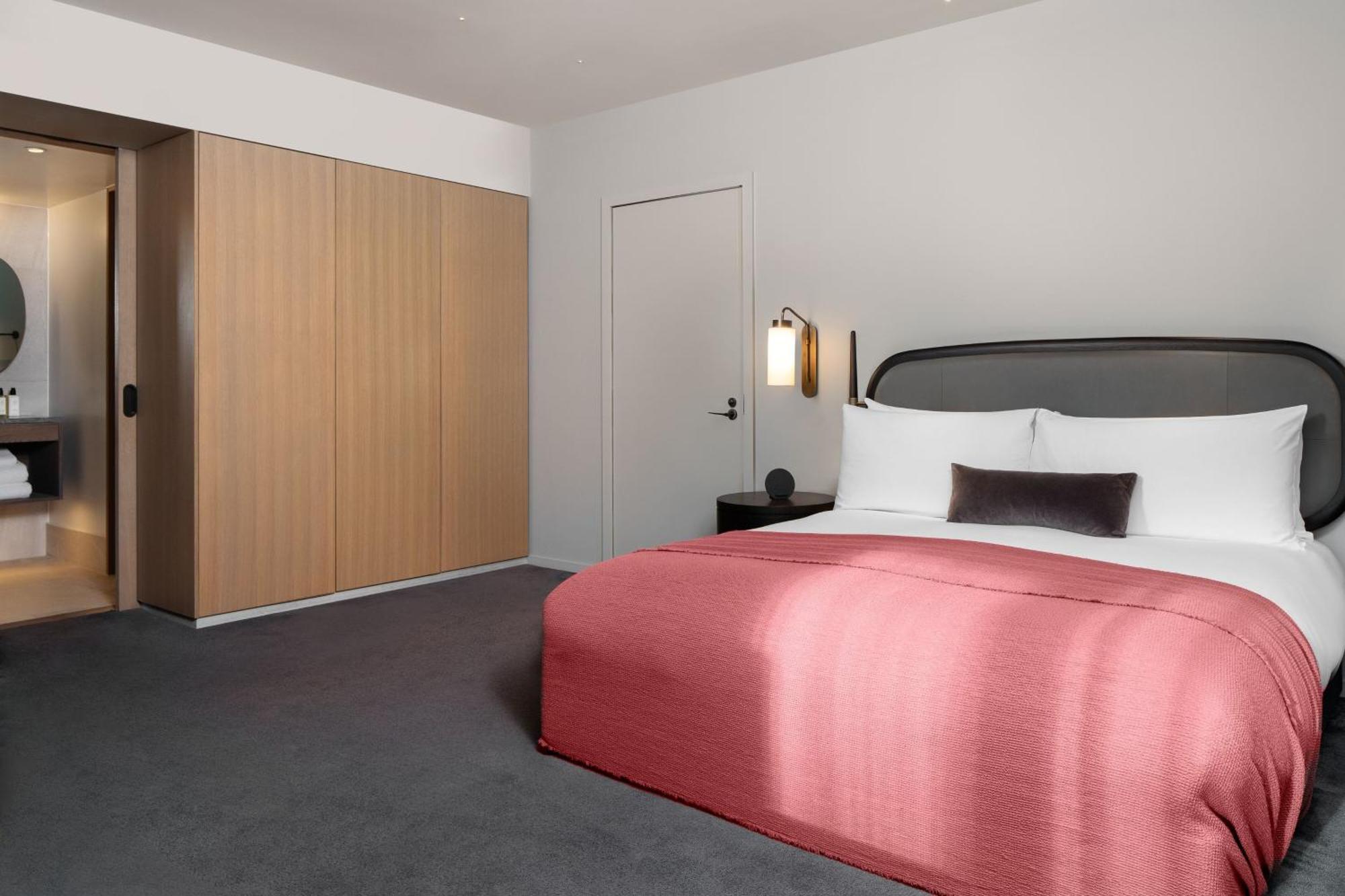 The Stratford, Autograph Collection Hotel London Kültér fotó A bedroom at the hotel